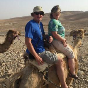 Dr. Myers, Headmaster of Dayspring Christian Academy, rides a camel with his wife as they teach seniors about the life of Jesus in Israel.